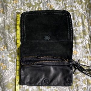 Linea Pelle Collecton Black Leather roll clutch